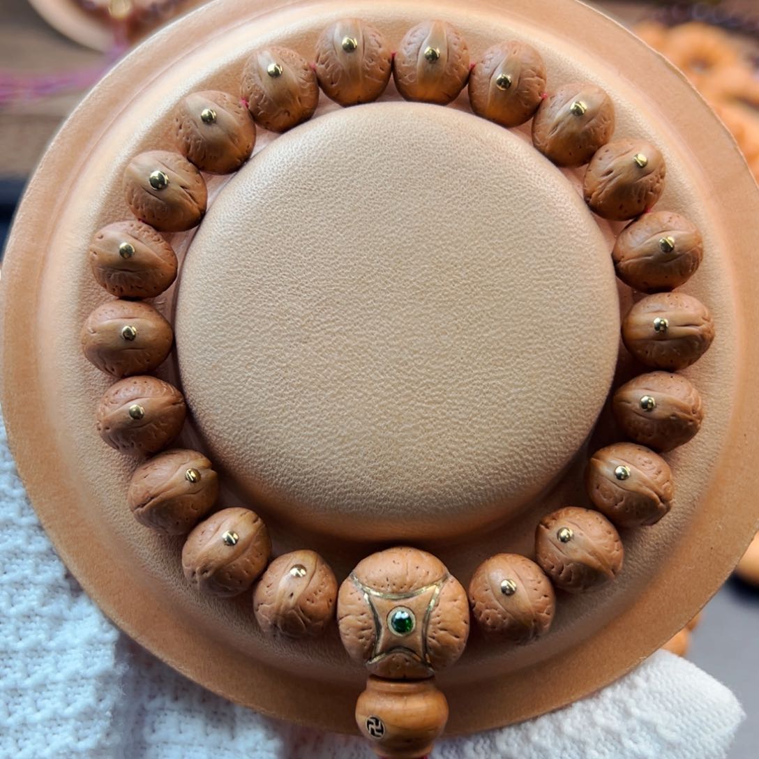 手串凤眼菩提12mm老树籽飞碟桩