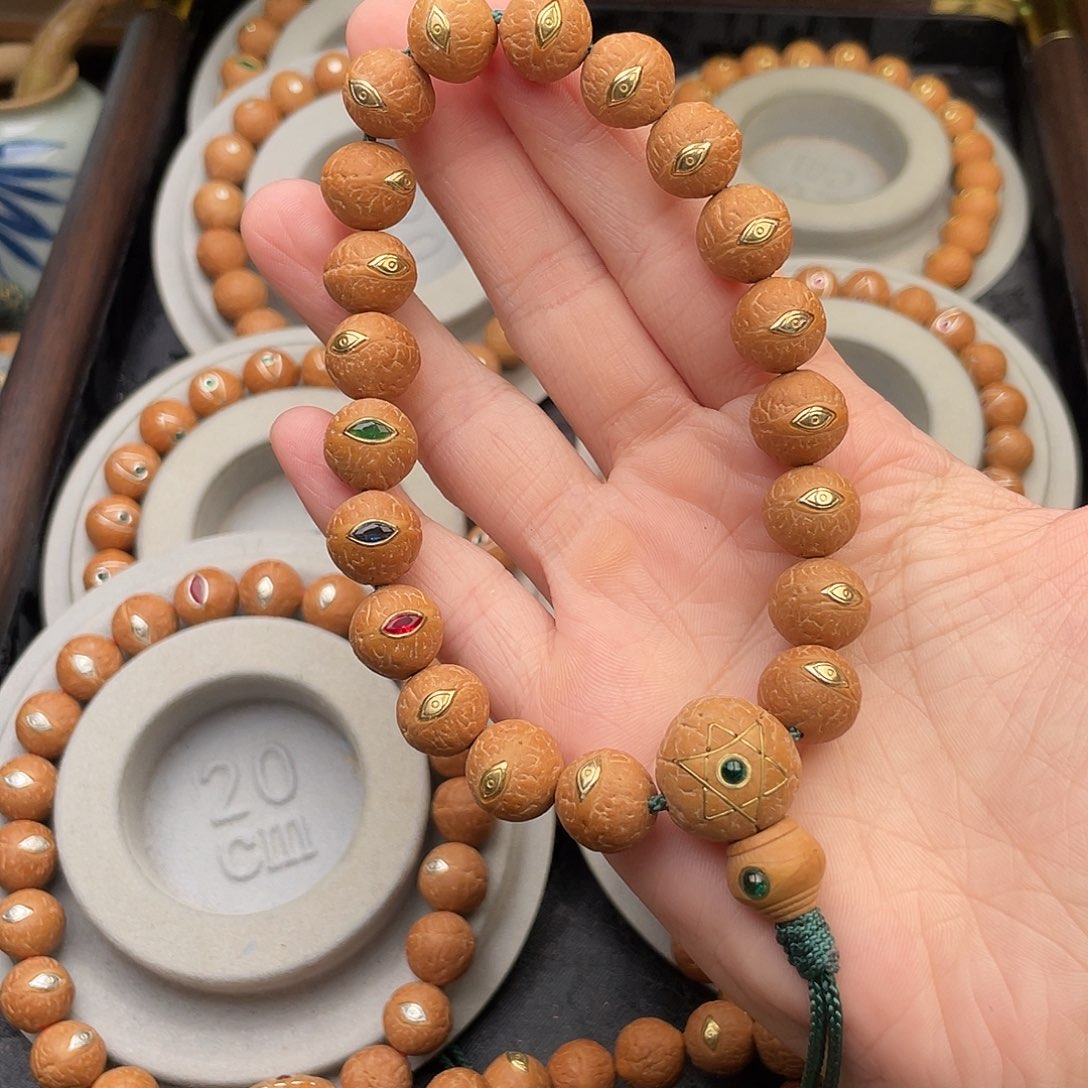 凤眼菩提吊坠紫金