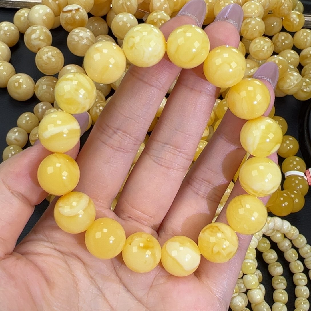 琥珀未镶嵌手链23.2黄白妖花