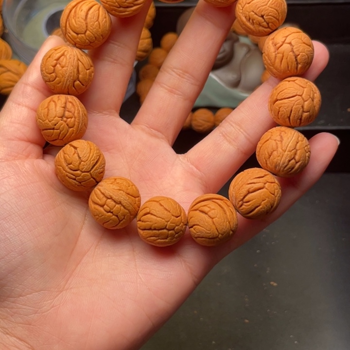桃核手串金丝龙珠18