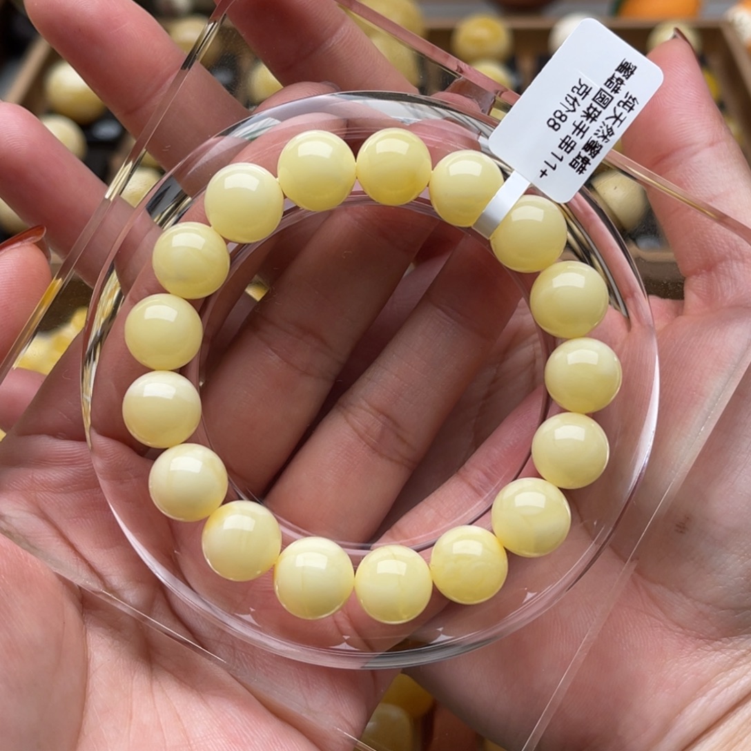琥珀未镶嵌裸石蜜蜡手串笑