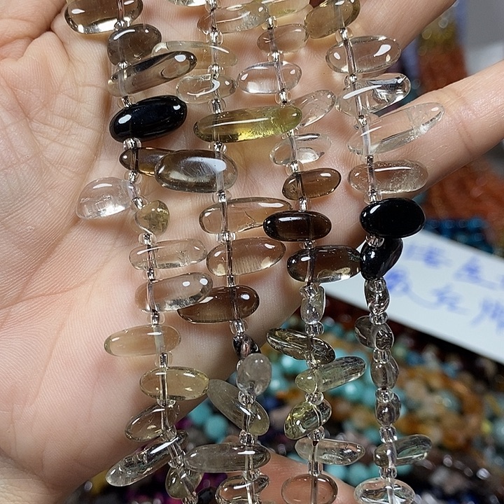 玛瑙/玉髓未镶嵌珠宝半成品天然茶晶牙牙一条