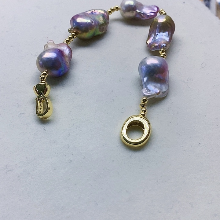 银S925镶嵌耳饰淡水珍珠阿****狗