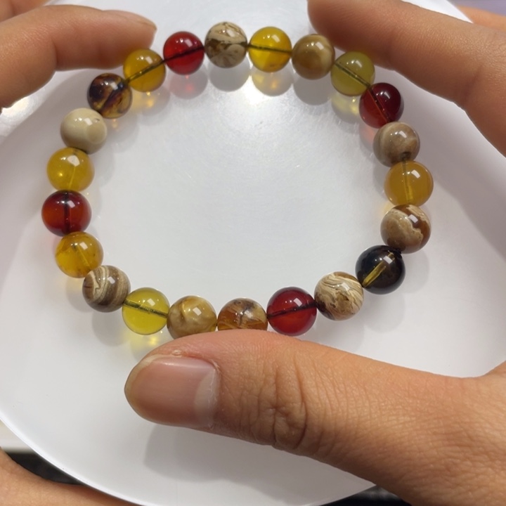琥珀手镯未镶嵌杨***?多宝手串8mm