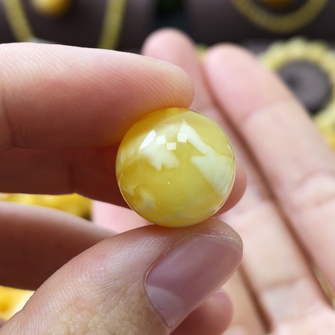 裸石琥珀未镶嵌王****良15.1mm金瓷白溶洞妖花 瑕