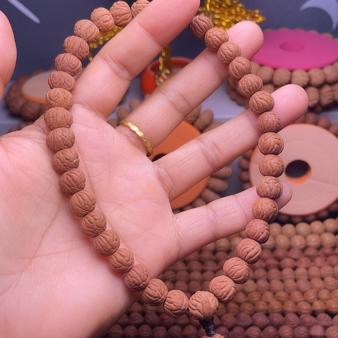 玫***戈吊坠桃核秦岭龙纹桃核小金豆手持36颗籽