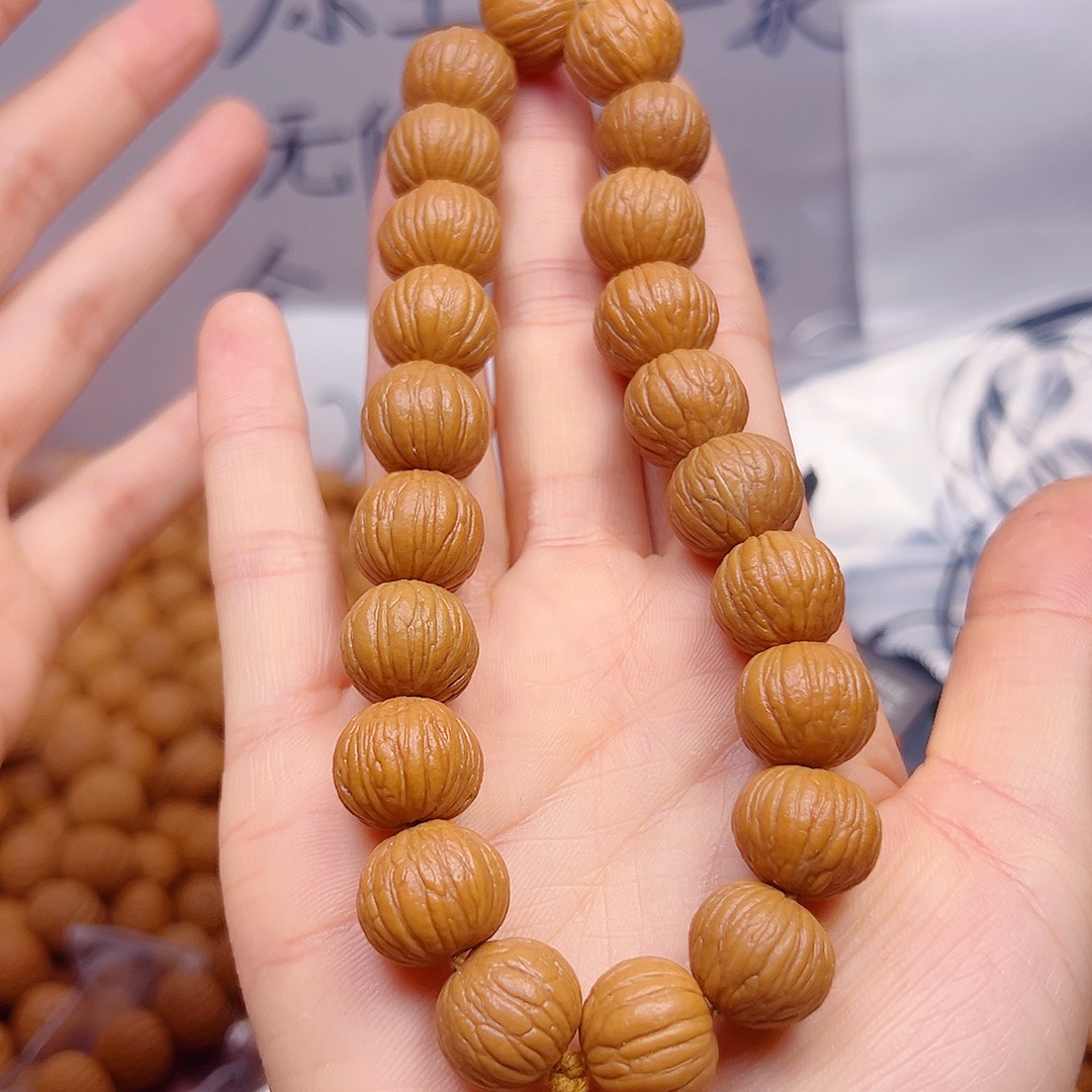 核桃猴头土豪手持22籽把件