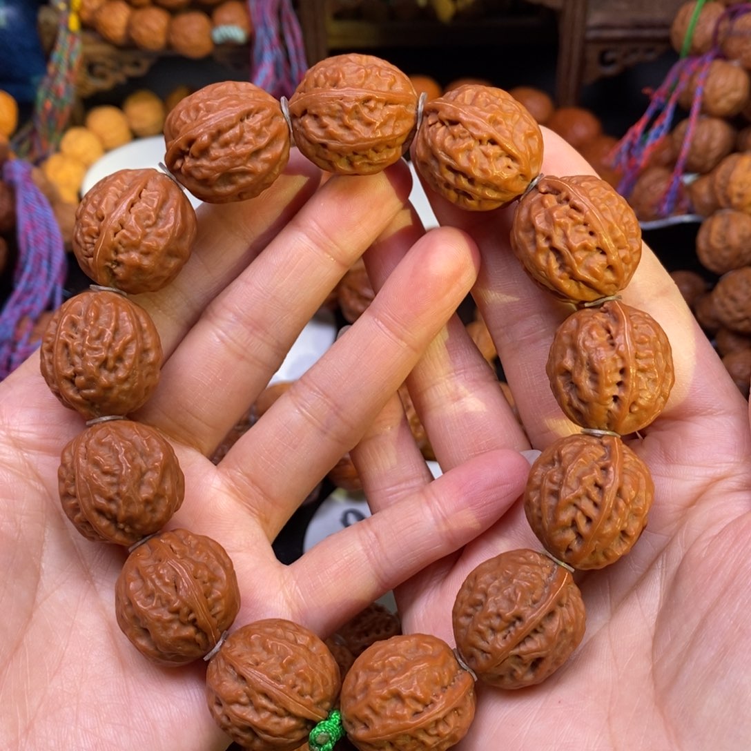 桃核手串麒麟鸽子蛋