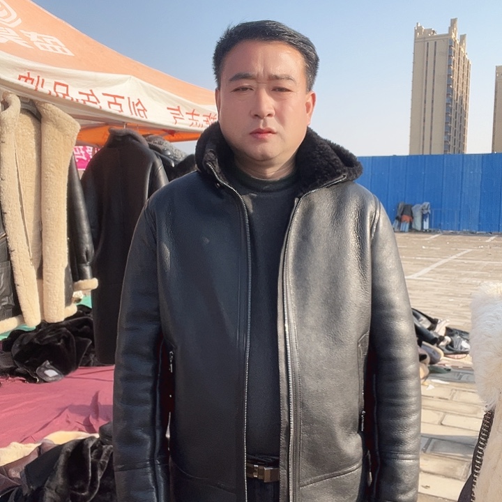 56码黑色戴帽款皮毛一体