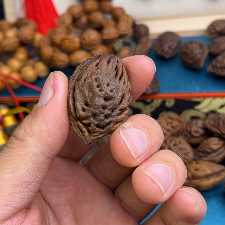 洪***洋木质非金属桃枭吊坠 桃枭吊坠