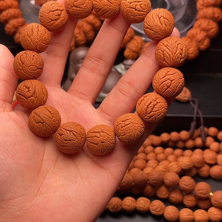 手串桃核金丝龙珠1.6