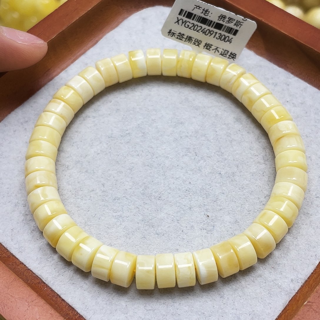 蜜蜡未镶嵌裸石7+mm.瑕