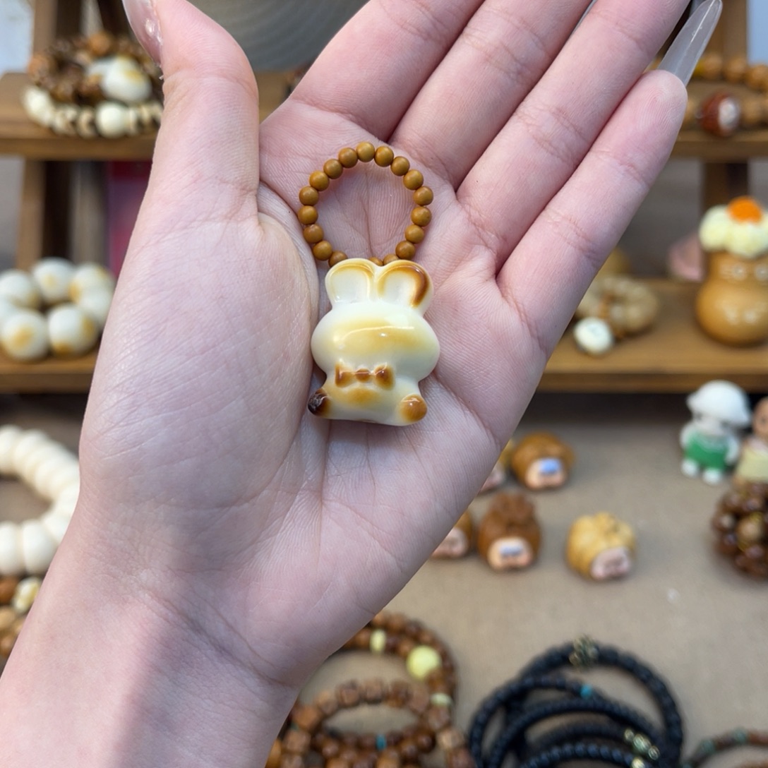 坏***娃吊坠菩提根/象牙果跑环配饰穿在上面