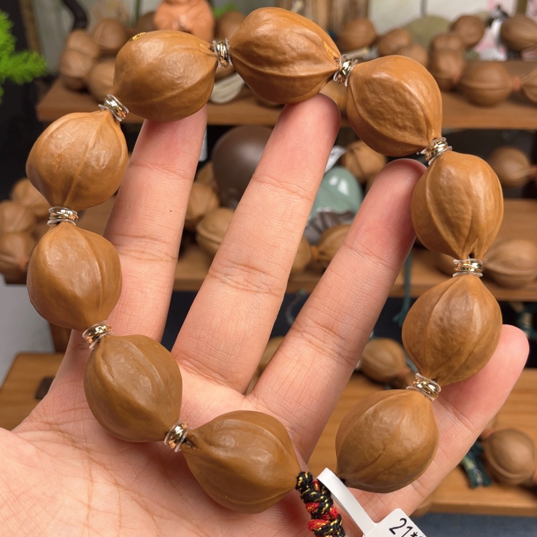 弓***生橄榄核手串/手链21*26梅林铁核
