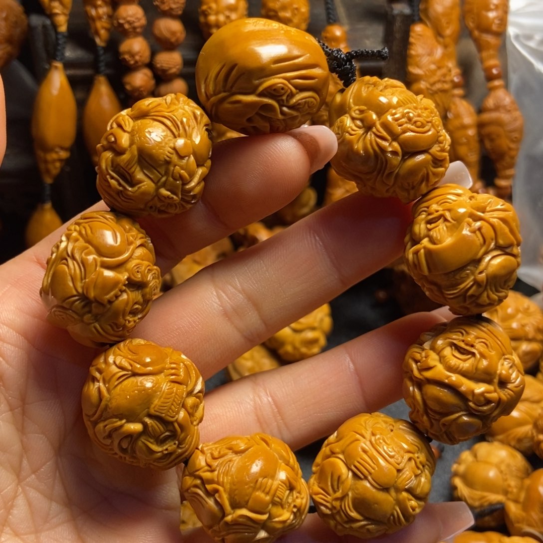 【闪购商品】手串/手链橄榄核何***着八方财神