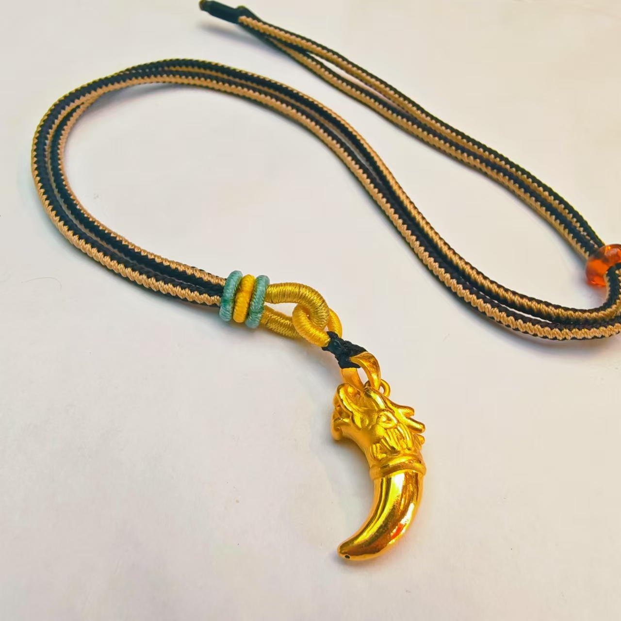 102#足金999 黄金龙牙吊坠 手工编绳