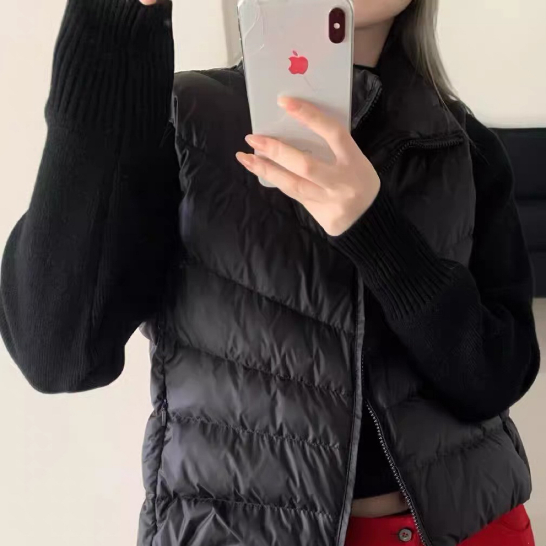 黑色羽绒拼接针织外套