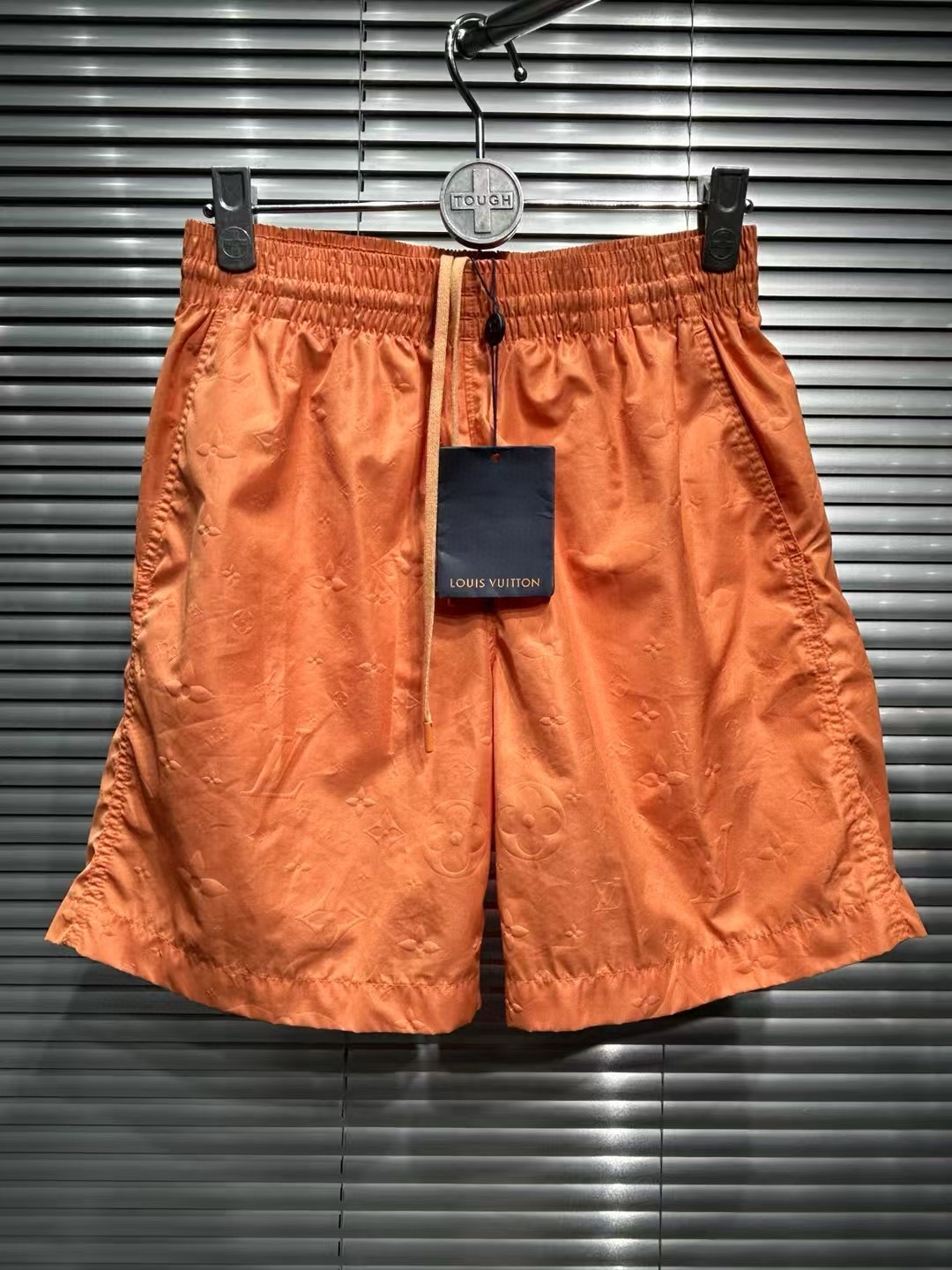 全新未使用 LouisVuitton/路易威登 24爆款浮雕满印橘色短裤/s码