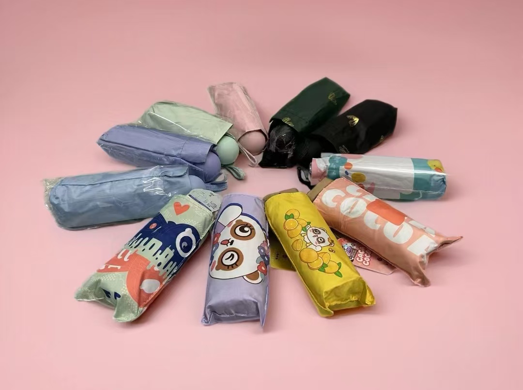  001—100  小巧黑胶防紫外线男女通用便携折叠两用伞