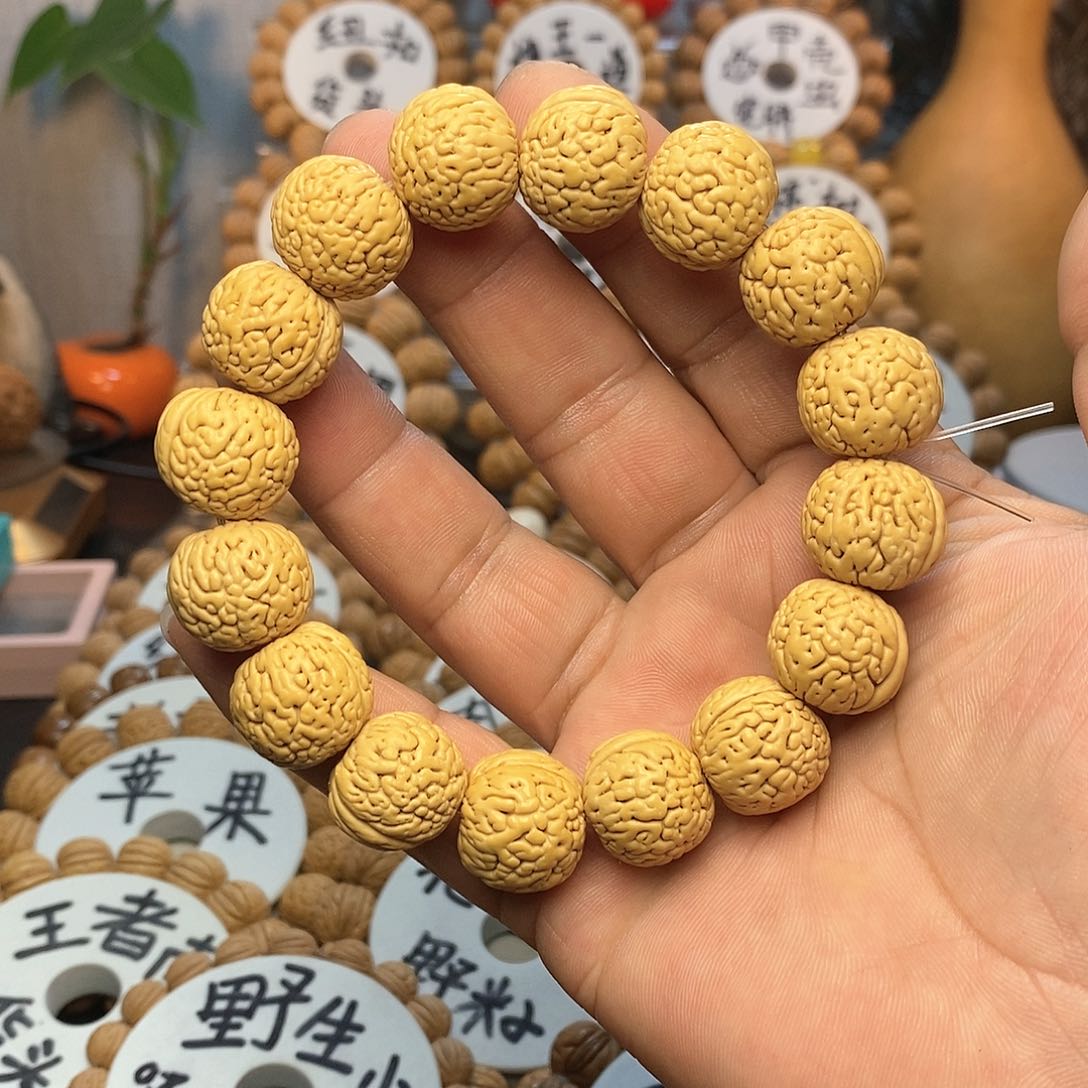 【闪购商品】郑**生桃核手串虎皮肌肉