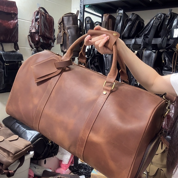 头层牛皮疯马皮旅行包xc