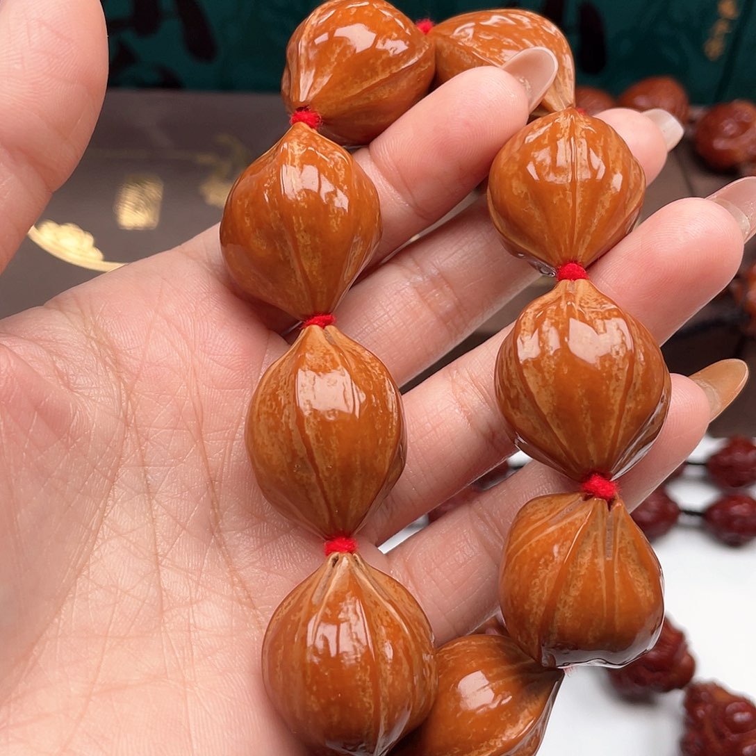 橄榄核手串厨*张素核手串