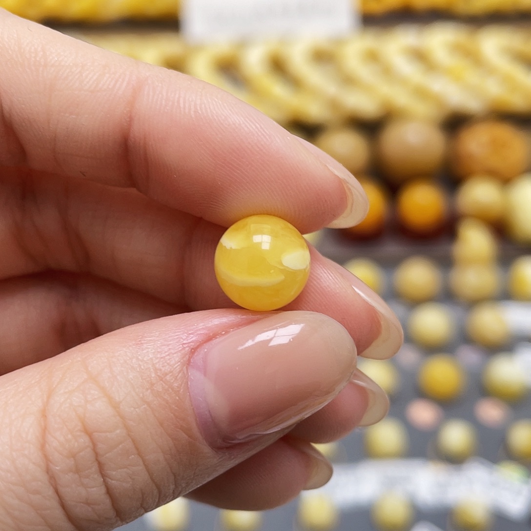 琥珀裸石未镶嵌蜜蜡圆珠9.9mm微瑕
