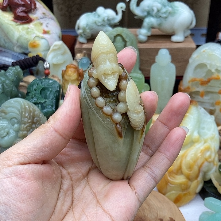 岫玉未镶嵌手把件