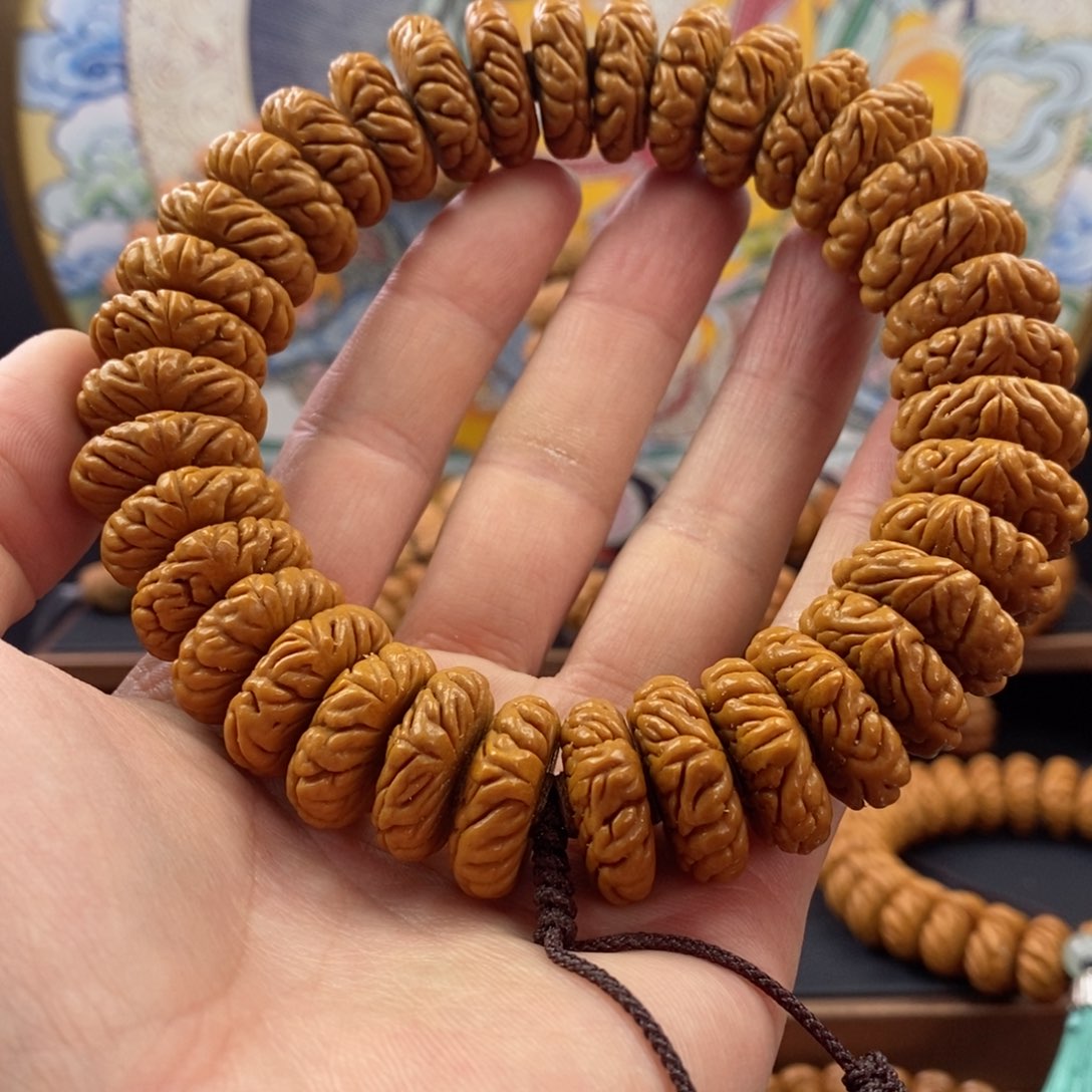 桃核手串北**哥22祥云纽扣