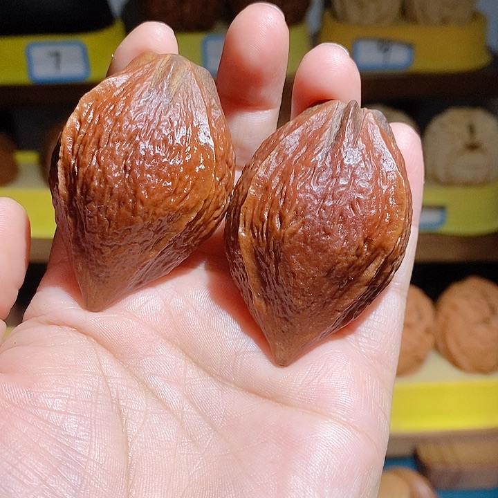 野生金蝉橄榄核手把件