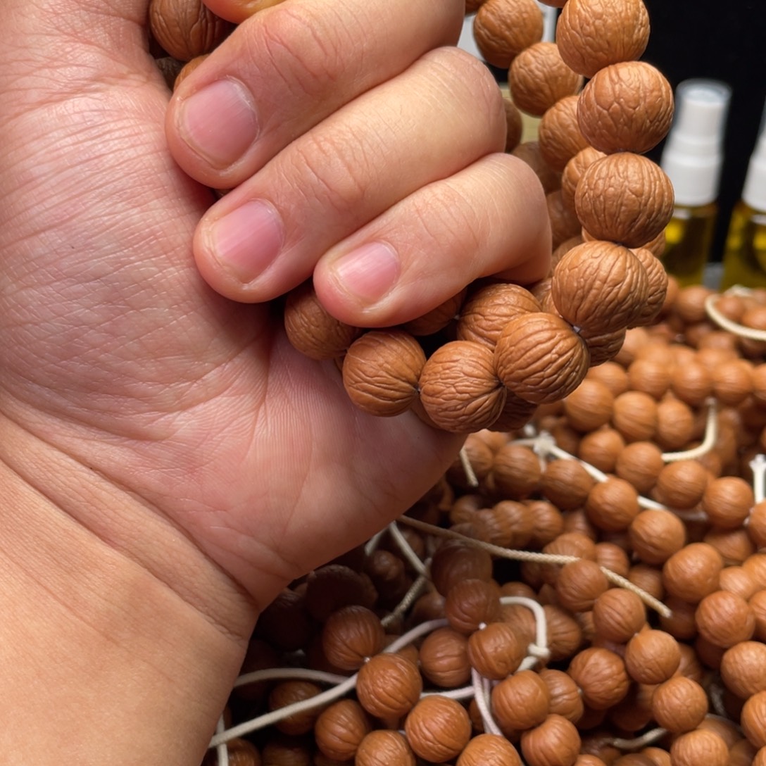 猴头核桃吊坠凤羽