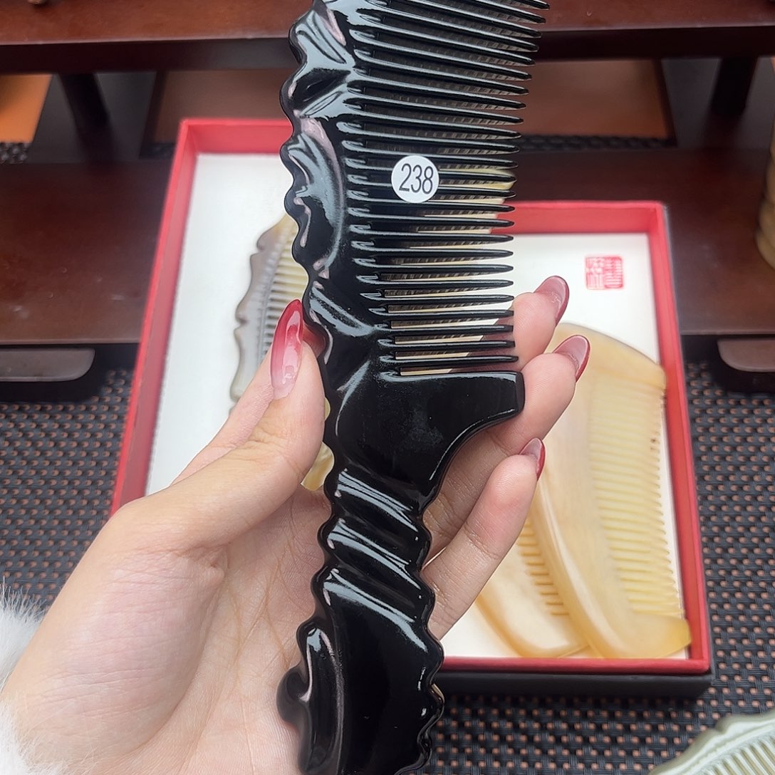呃***，手工制作纯牛角梳子