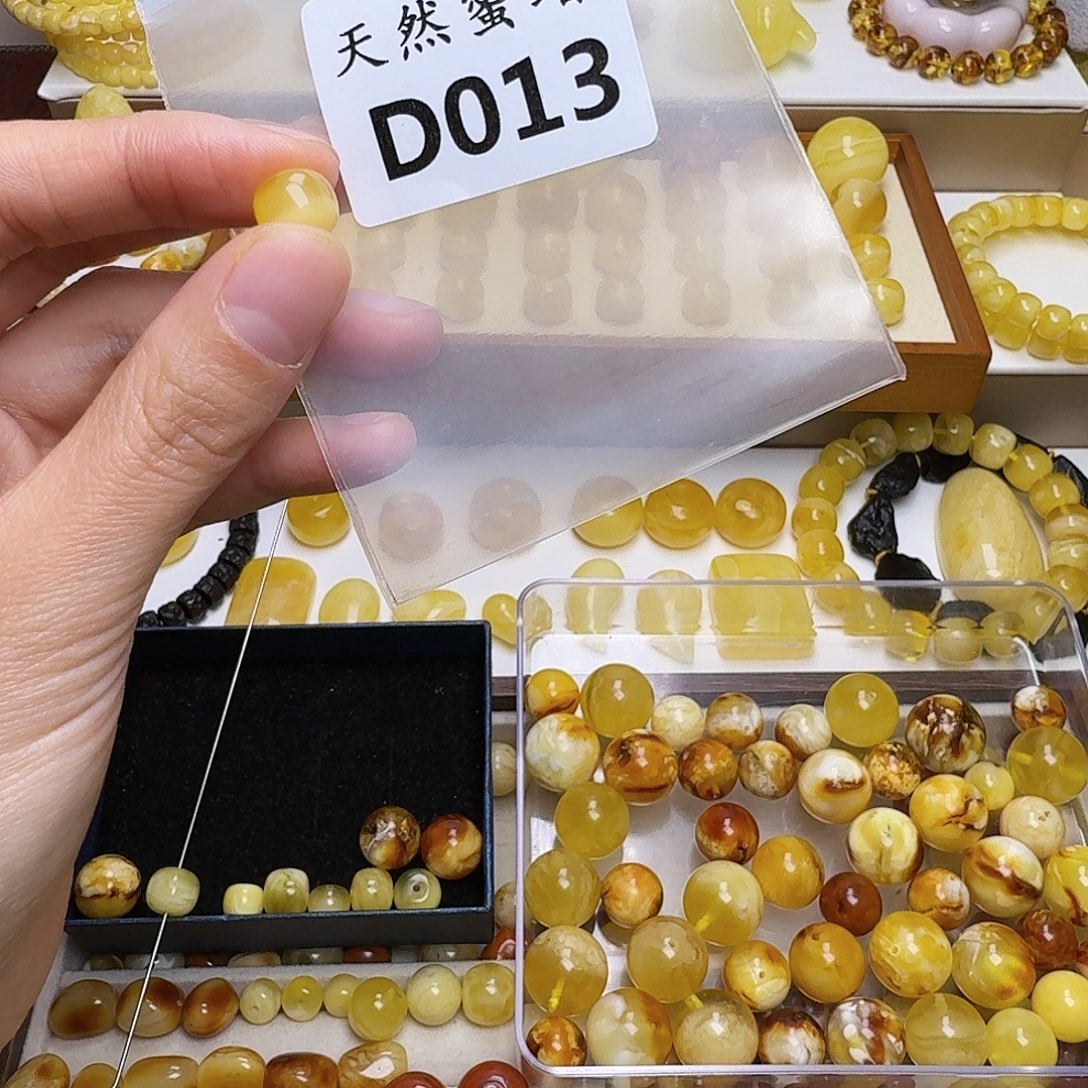 刘***住琥珀未镶嵌裸石013号，9.9mm