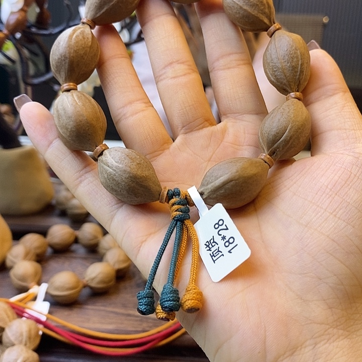 胡***意吊坠橄榄核梅林铁核