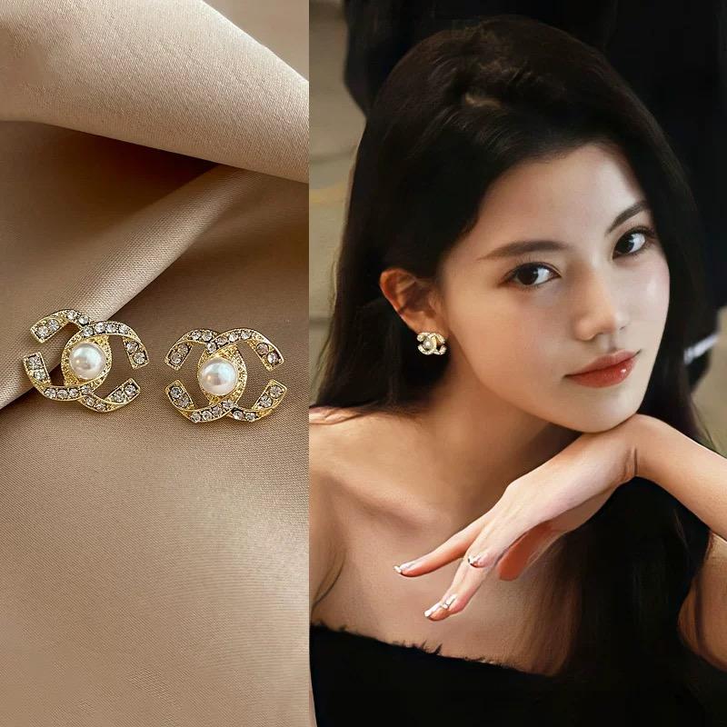 925银耳饰 交叉珍珠耳钉秋冬配饰微镶锆石轻奢小众设计202