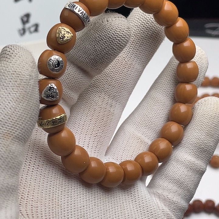 猴头核桃手串神**。直切镶嵌款