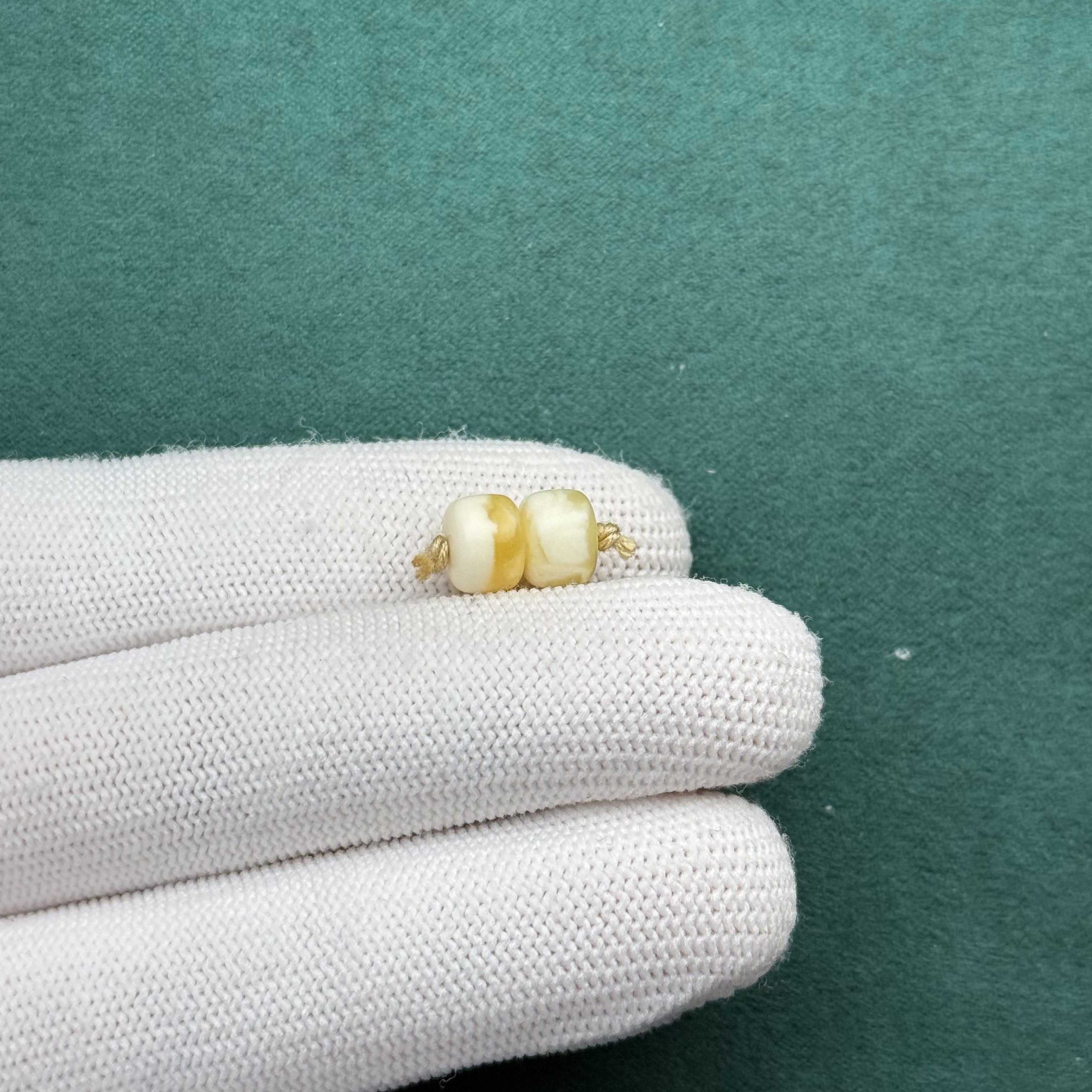 F3361天然原矿蜜蜡 对珠7.7*5.7mm 支持鉴定 假一罚十