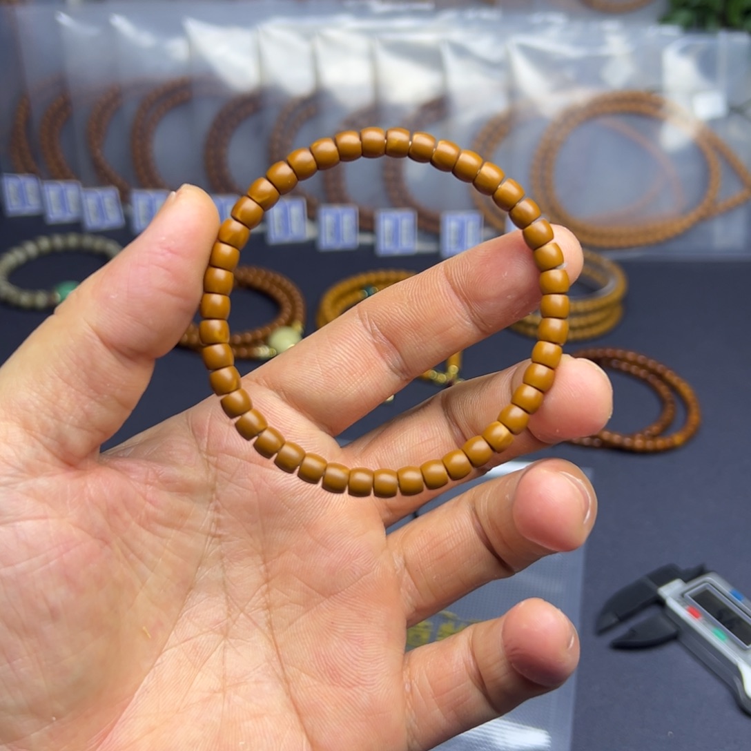 手串橄榄核老挝核尖5.6竞拍24 号