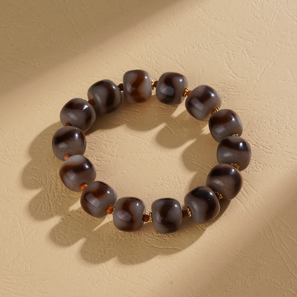 云丹拉姆丨玉化牙牙天珠手串多样性发其一约12*14