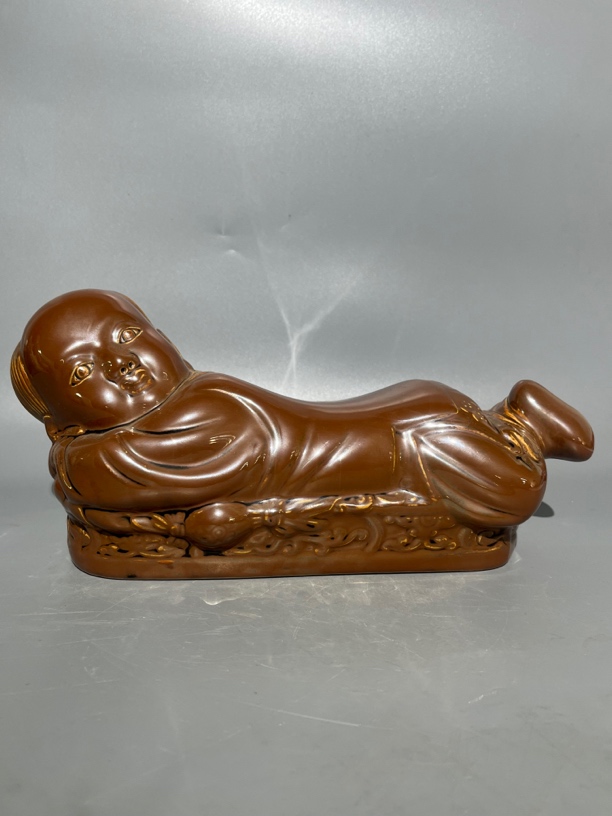 定窑紫金釉男孩娃娃枕