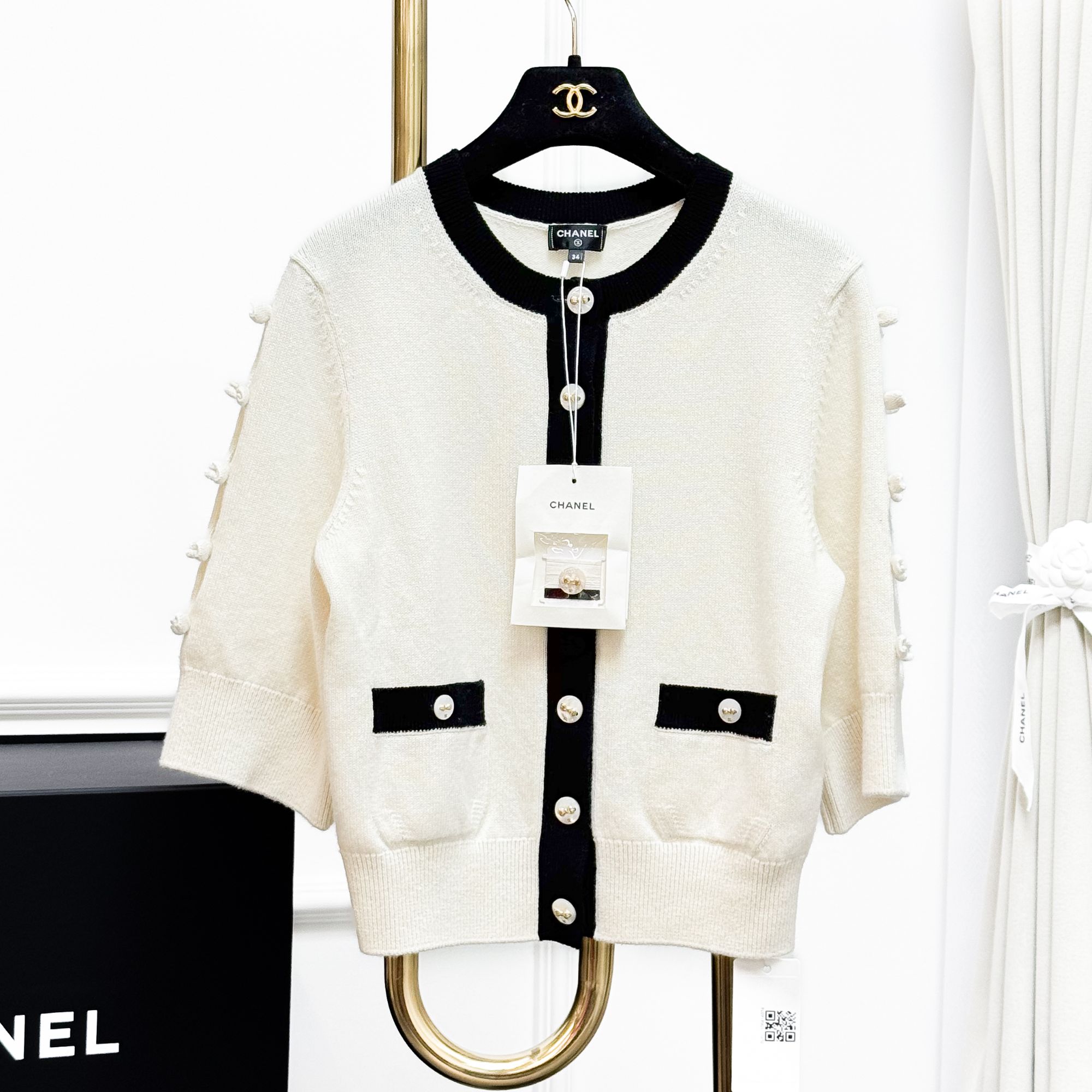 99新 Chanel/香奈儿 34码25K白色黑边蝴蝶结七分袖针织上衣