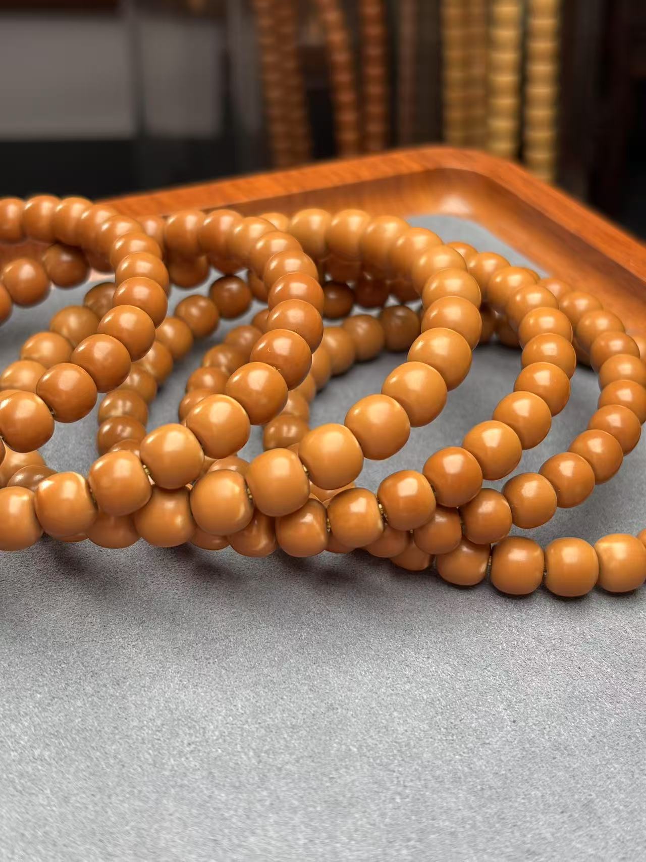 精工红皮老挝橄榄核核尖极限弧老型原皮原色单圈手串带三花7-8