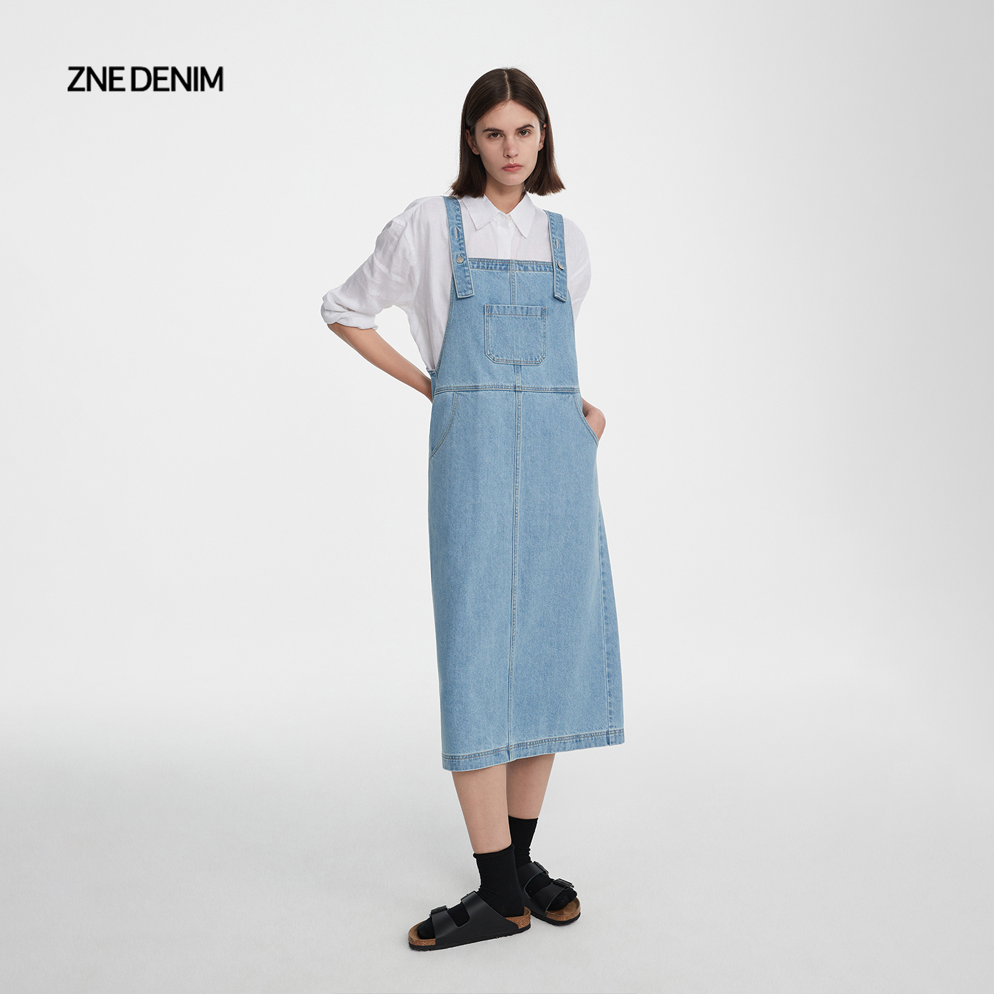 ZNE气质全棉水洗质感浅蓝色后开衩系扣可调节背带牛仔长裙817
