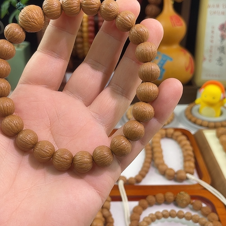 小***呆吊坠猴头核桃凤羽
