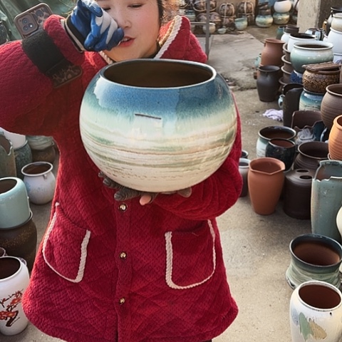 口19高22瑕疵盆子。