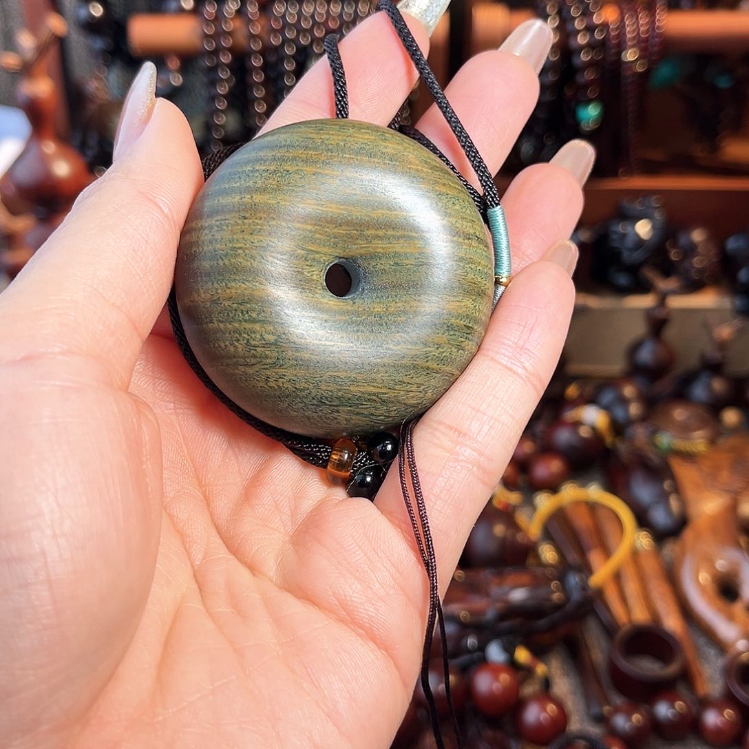 M***o阿根廷绿檀平安扣手把件