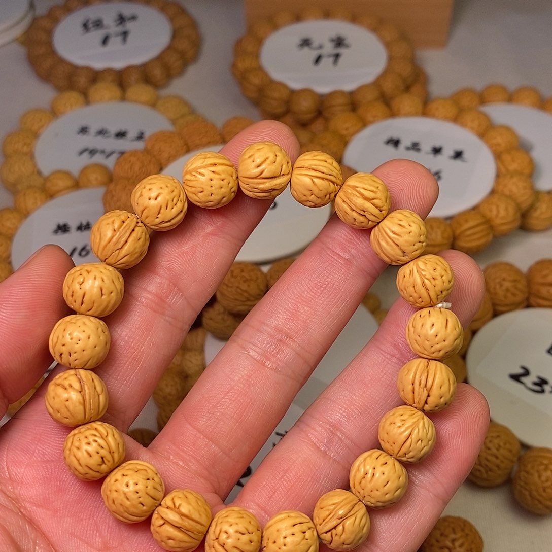 計***東吊坠桃核精品桃核手串金豆