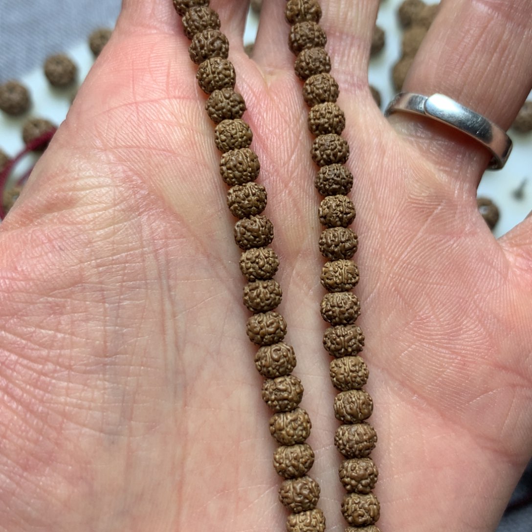 金刚菩提吊坠M****?一代龙卡5手持 