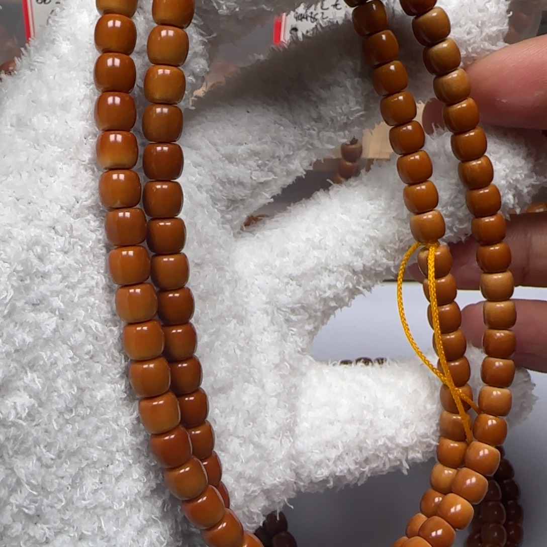 橄榄核吊坠老挝7.0mm三花面无白长串