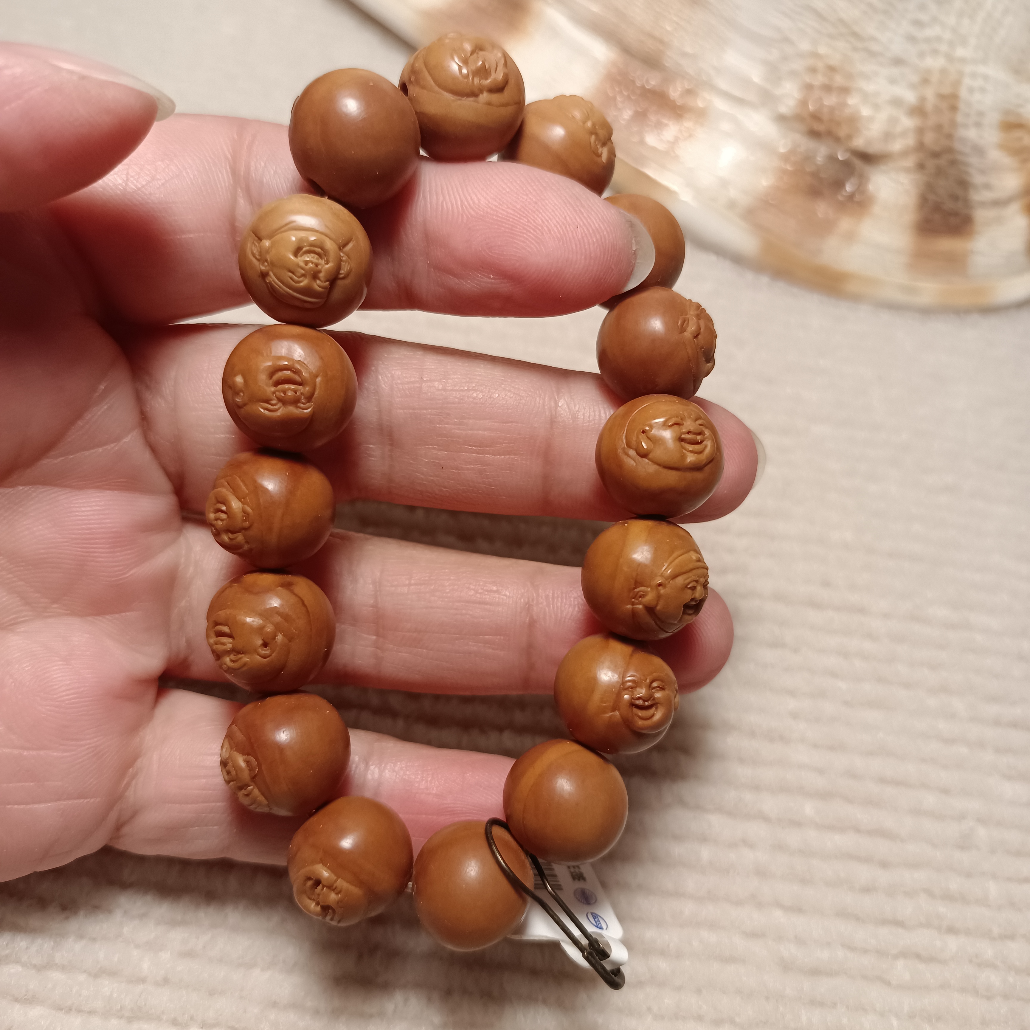 橄榄核浮雕和气生财